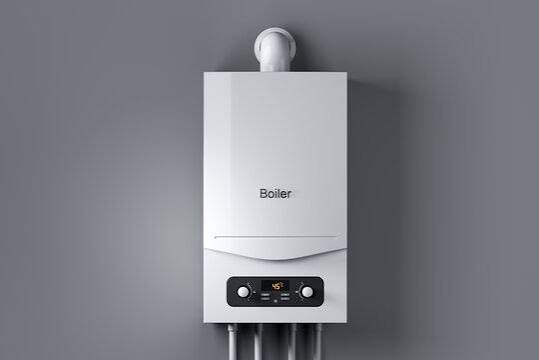 Modern wall-mounted combi boiler supplying hot water and heating